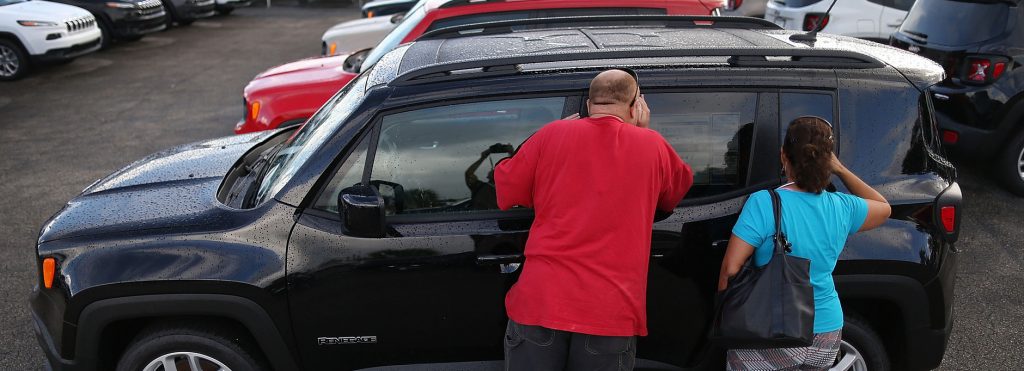 South Florida Customers shopping certified pre owned jeeps at Wallace CDJR