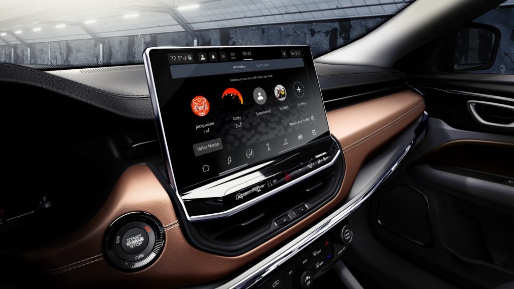 Infotainment System touch screen shows drivers playlist settings inside the 2022 Jeep Compass.